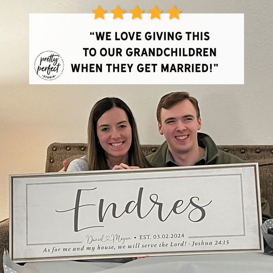 Couple holding a personalized sign with their name 'Endres' and wedding date, with a five-star rating and review.