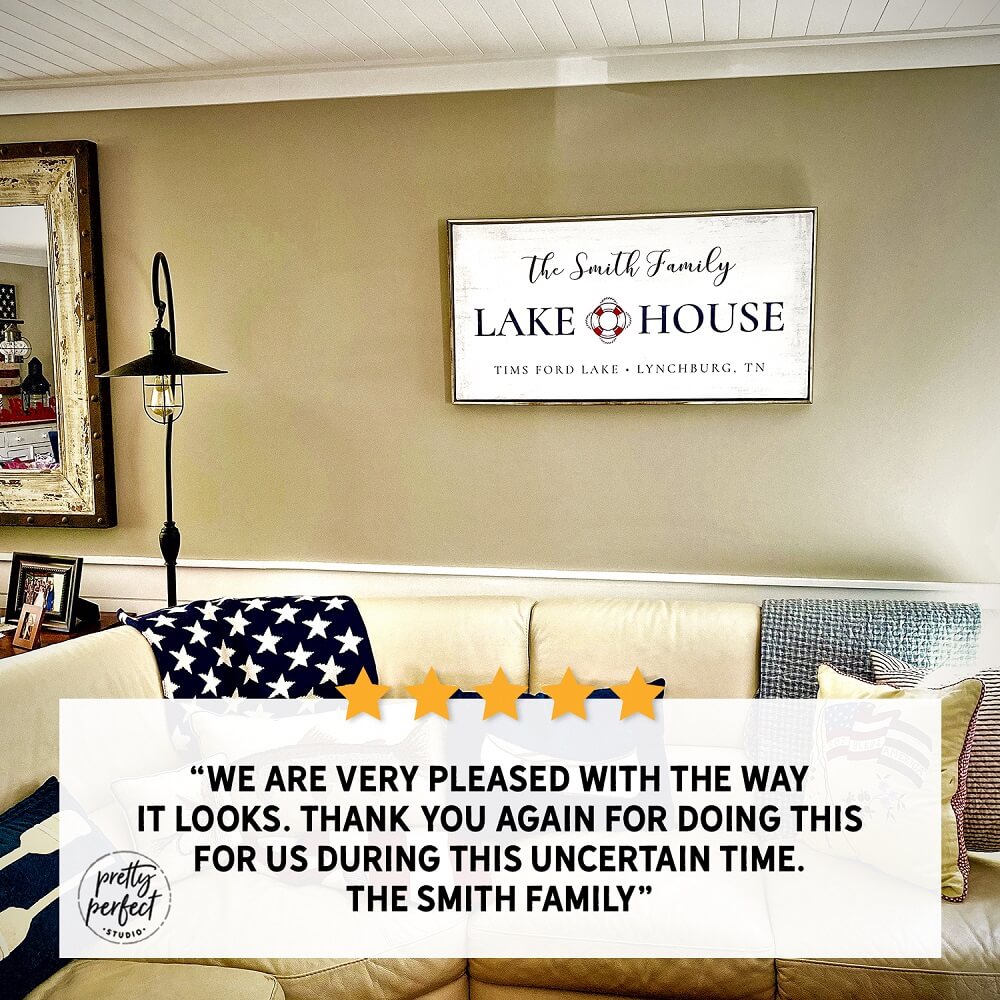 personalized lake house canvas sign with custom family name rustic wall decor displayed above couch in living room testimonial image