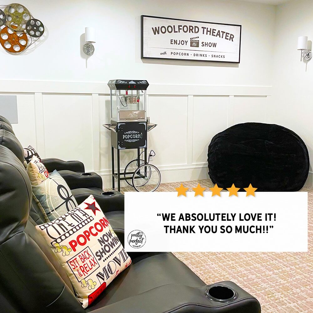 Personalized cinema lounge sign on canvas enhancing a modern home movie room decor