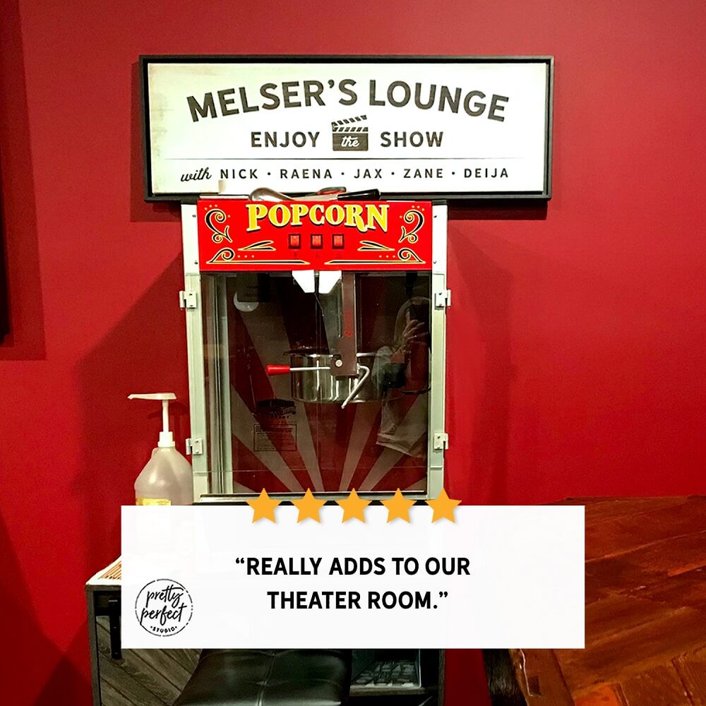 Personalized movie lounge sign on canvas displayed in a stylish home theater decor setup