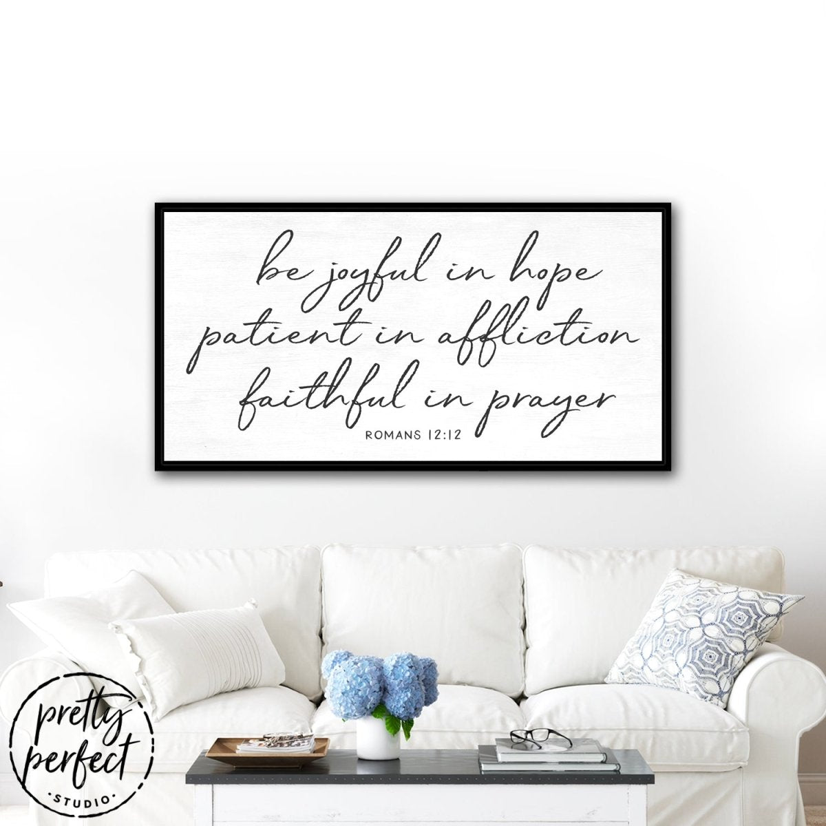 Be Joyful In Hope Sign Hanging on Wall Above Couch – Pretty Perfect Studio