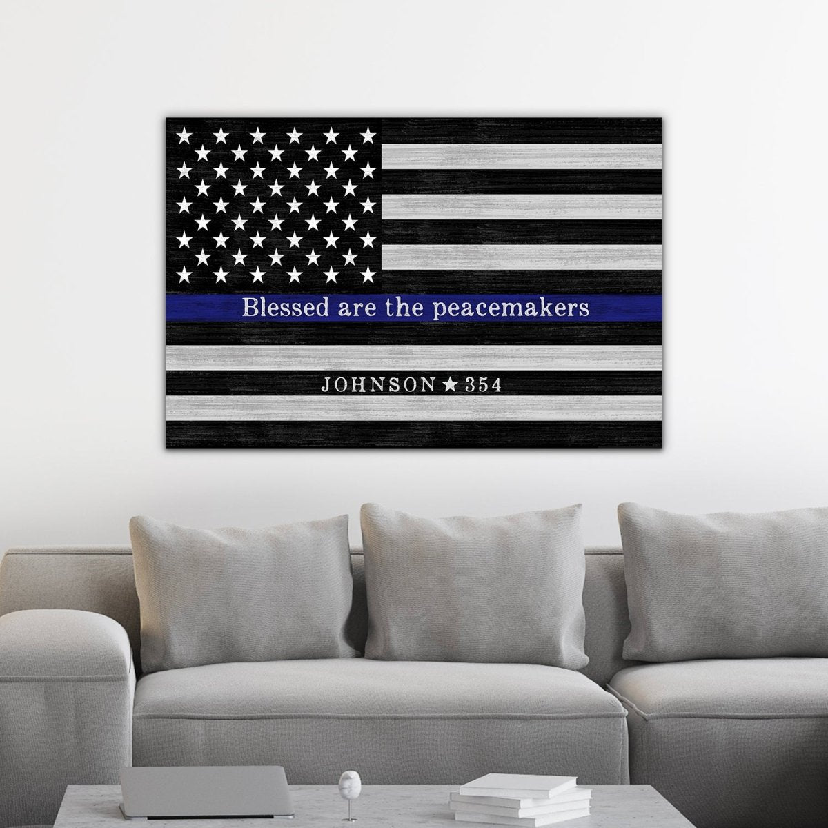 Custom Blue Line Sign With Name and Badge Number Above Couch in Living Room - Pretty Perfect Studio