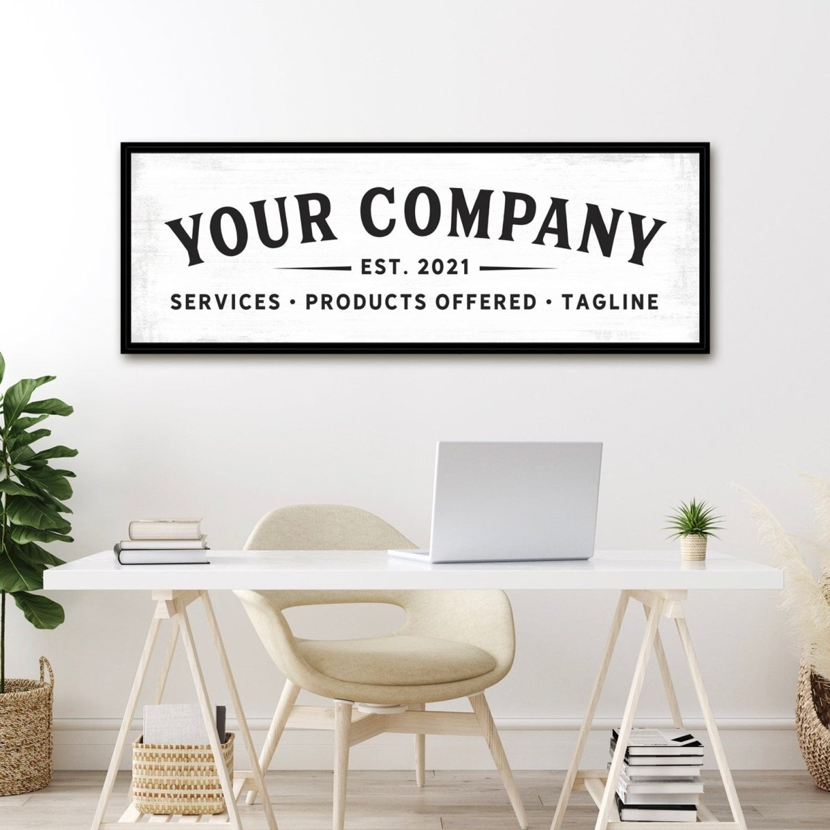 personalized business sign wall art with company name, established date and services tagline displayed above desk in modern home office workspace
