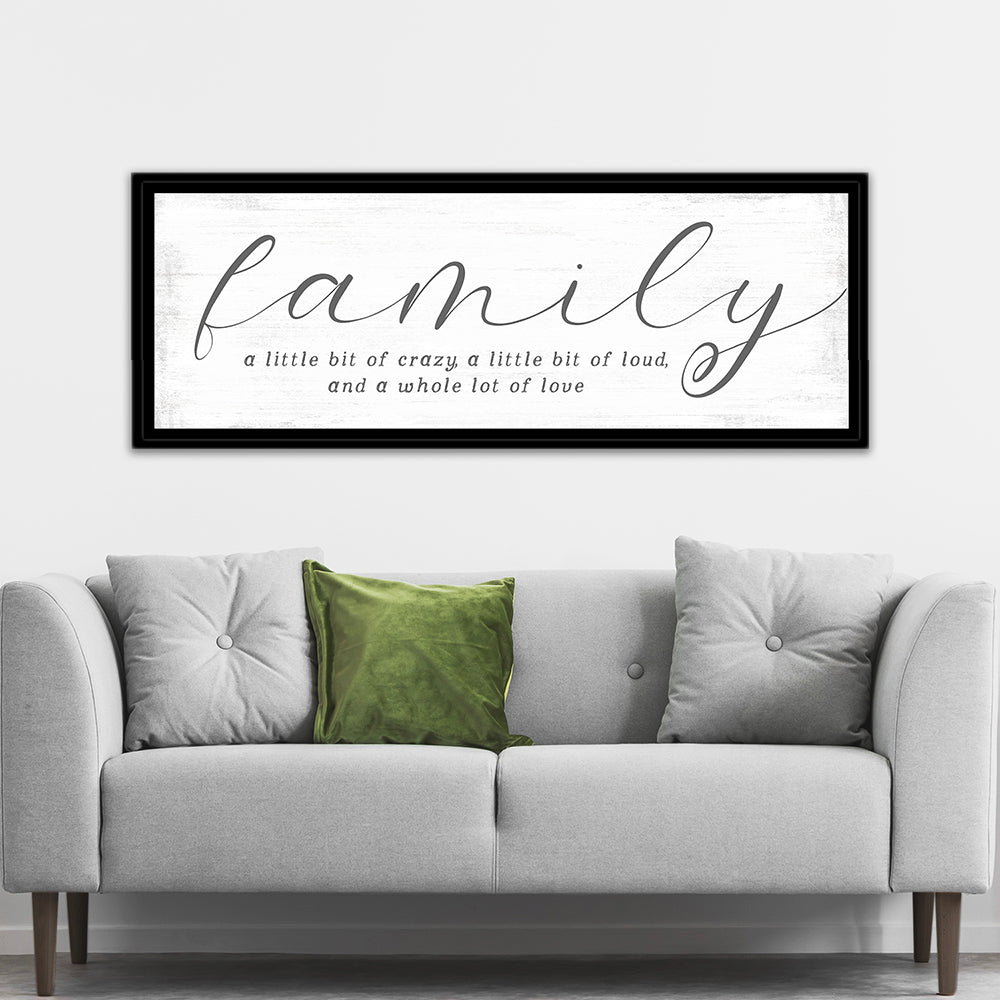 Family A Little Bit Of Crazy Sign Above Couch - Pretty Perfect Studio