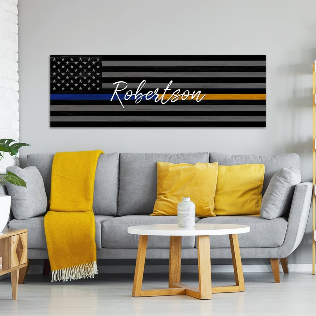 Gold Line Flag Sign For 911 Dispatchers & Tow Truck Drivers Above The Couch - Pretty Perfect Studio