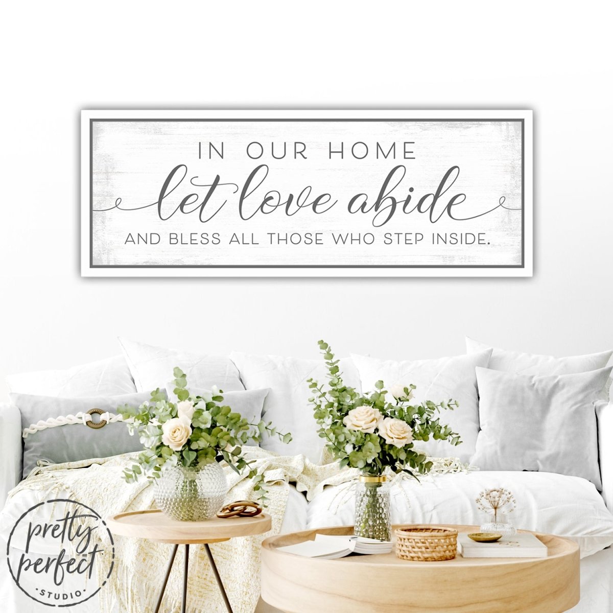 n Our Home Let Love Abide Sign Above Couch - Pretty Perfect Studio