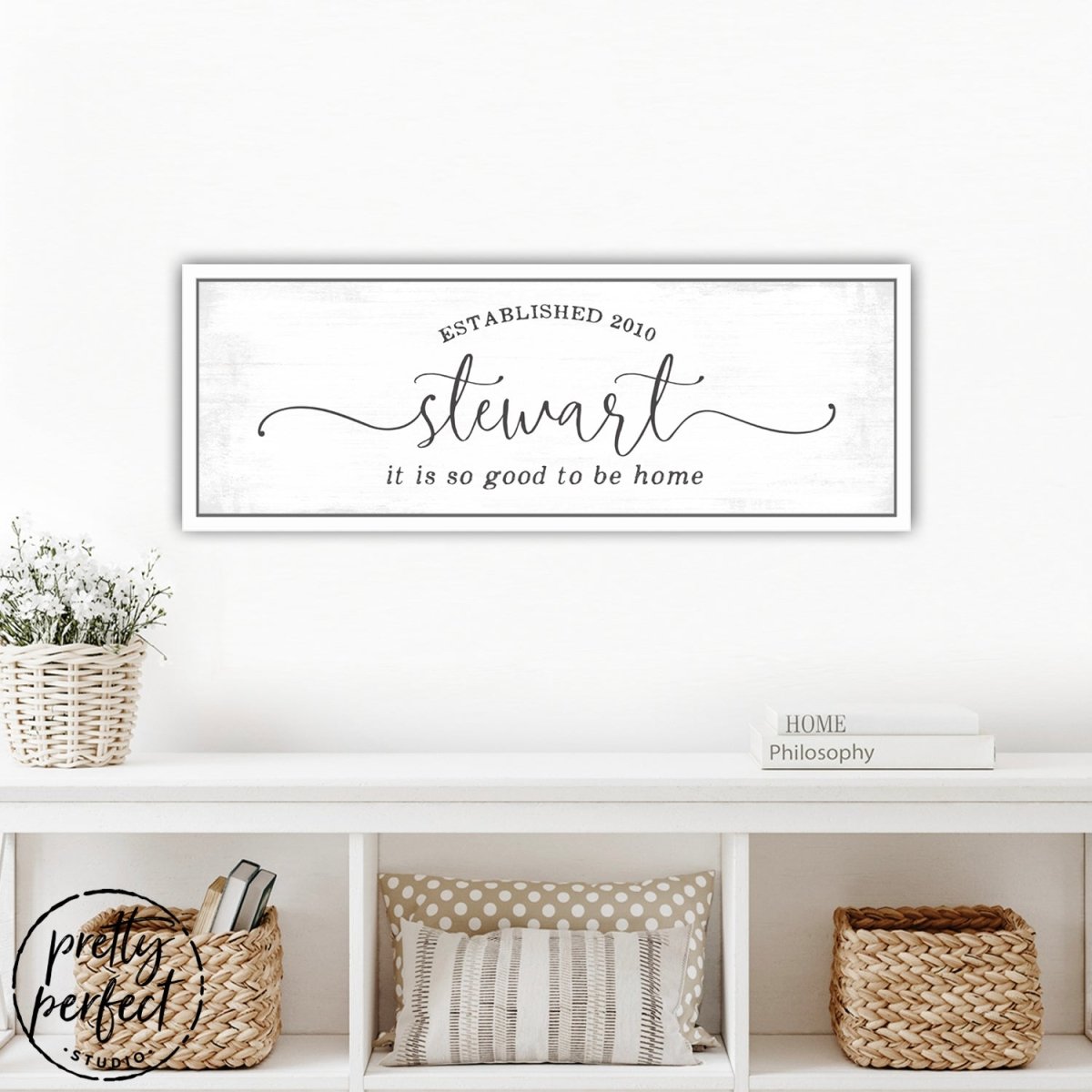 It's So Good To Be Home Personalized Family Name Sign Above Table in Living Room - Pretty Perfect Studio