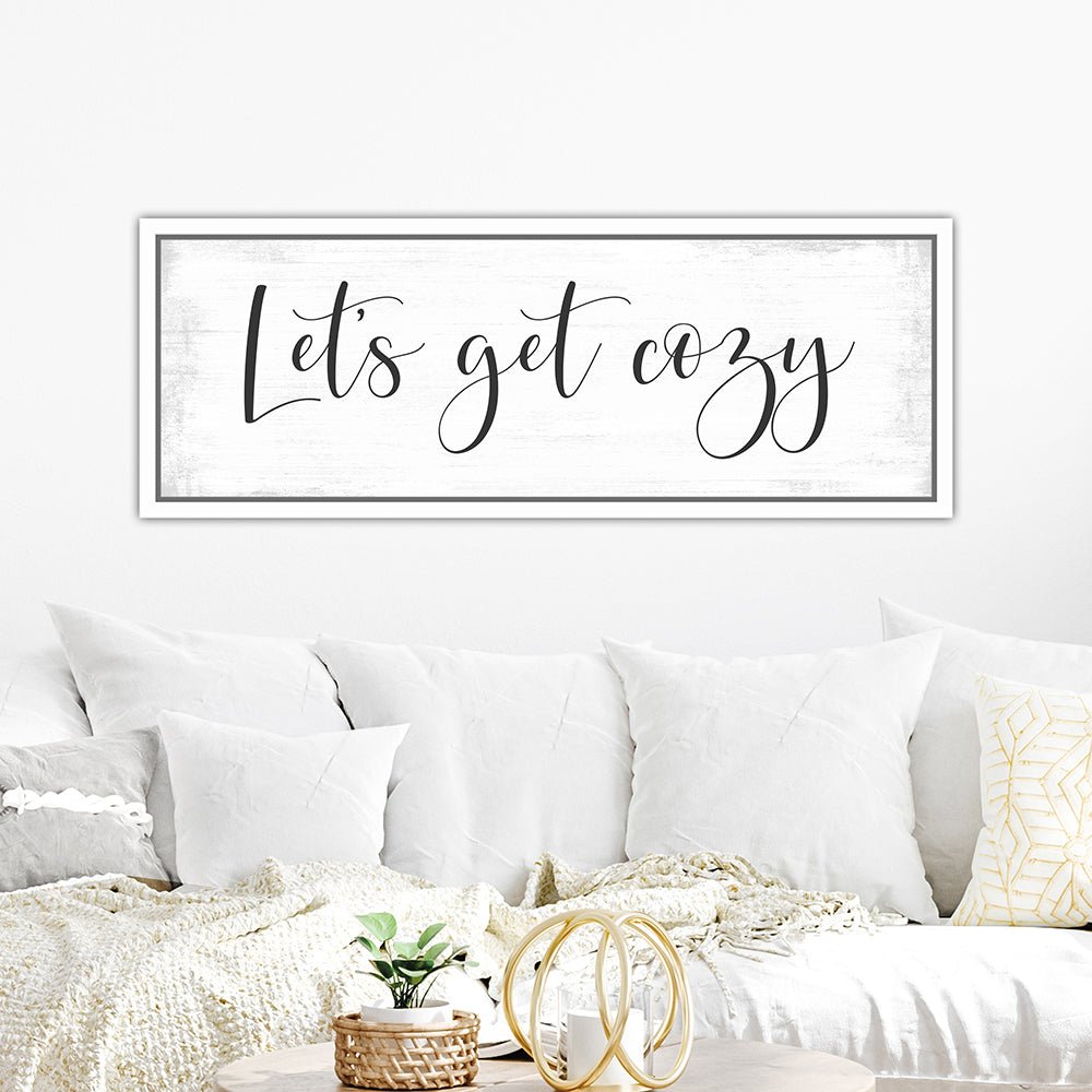 Let's Get Cozy Sign Hanging Above the Couch - Pretty Perfect Studio