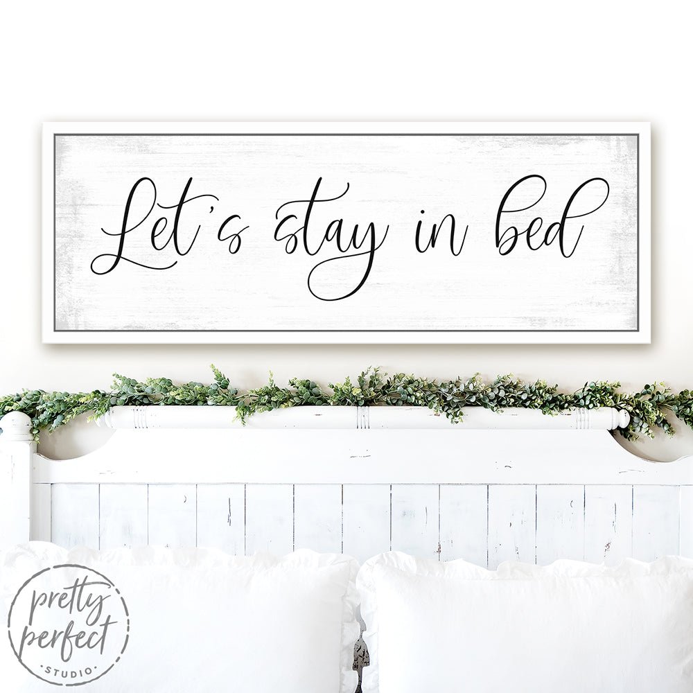 Let's Stay In Bed Canvas Sign Above Shelf - Pretty Perfect Studio