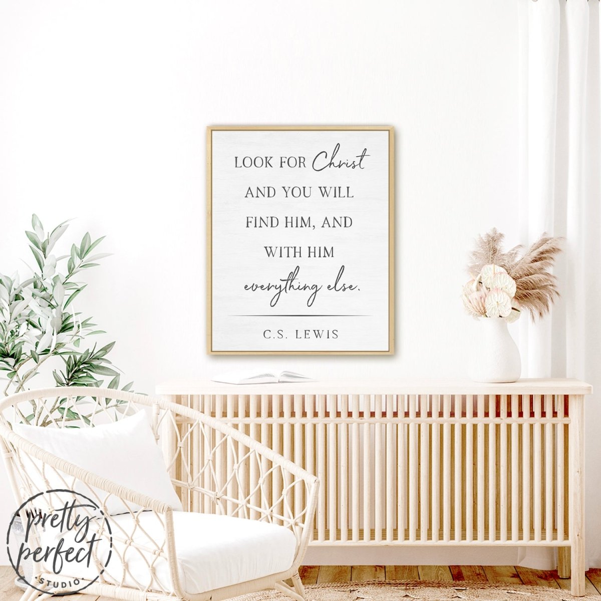 Look For Christ CS Lewis Sign Hanging on Wall Above Table in Living Room - Pretty Perfect Studio