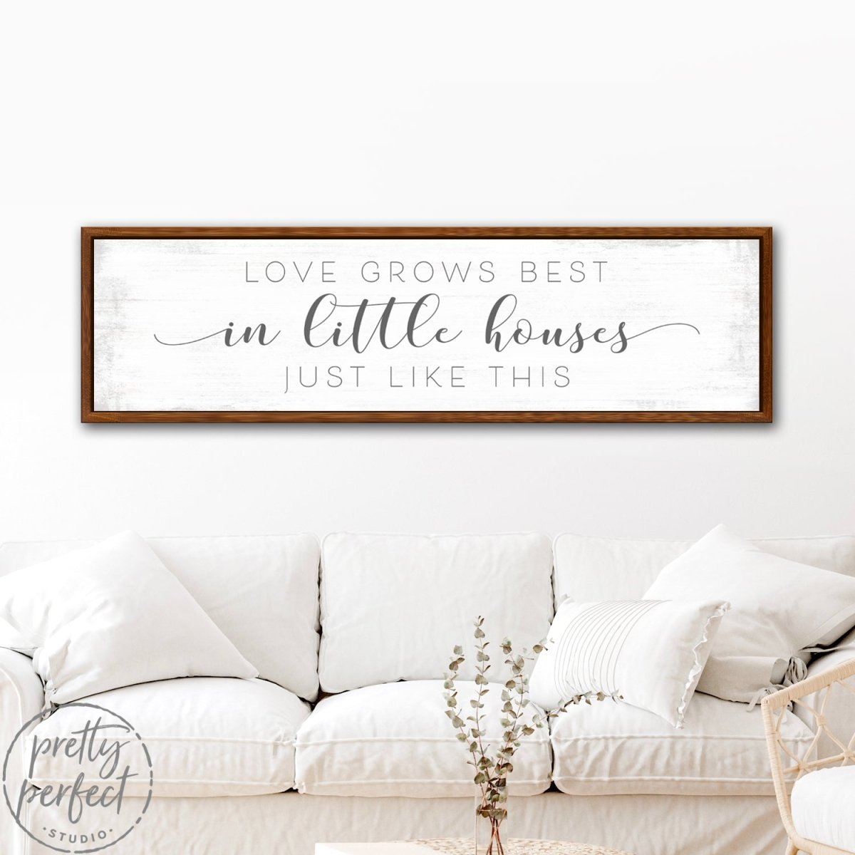 Love Grows Best In Little Houses Sign Above Couch - Pretty Perfect Studio