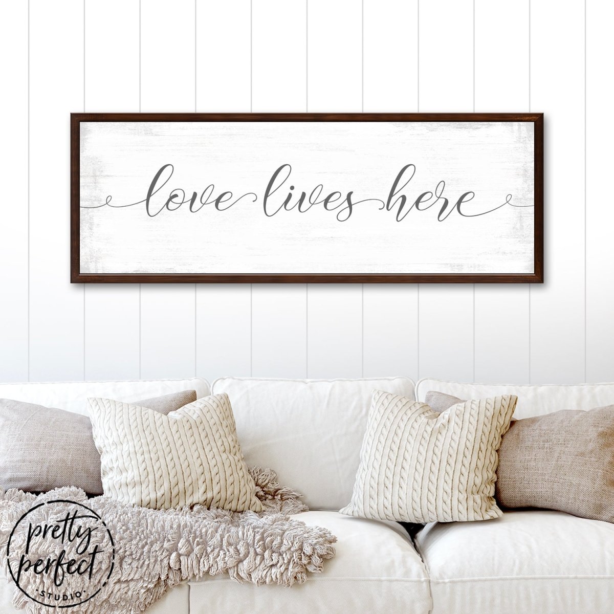 Love Lives Here Sign Above Couch - Pretty Perfect Studio