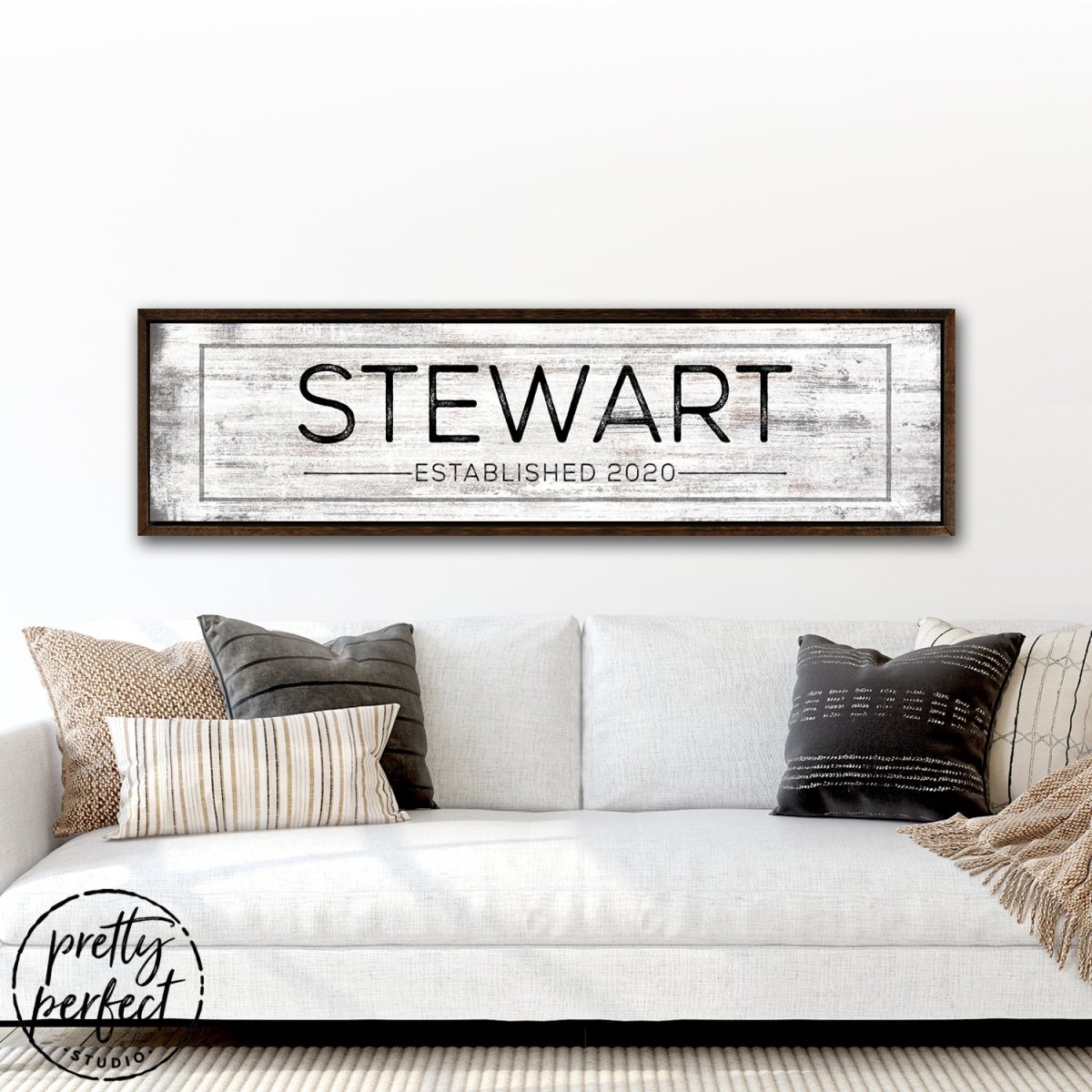 Personalized Family Name Established Sign Above Couch in Living Room - Pretty Perfect Studio