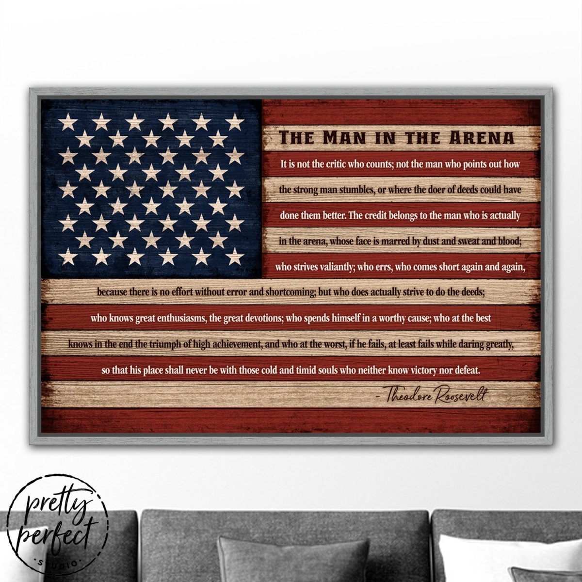 The Man In The Arena Flag Sign Above Couch - Pretty Perfect Studio