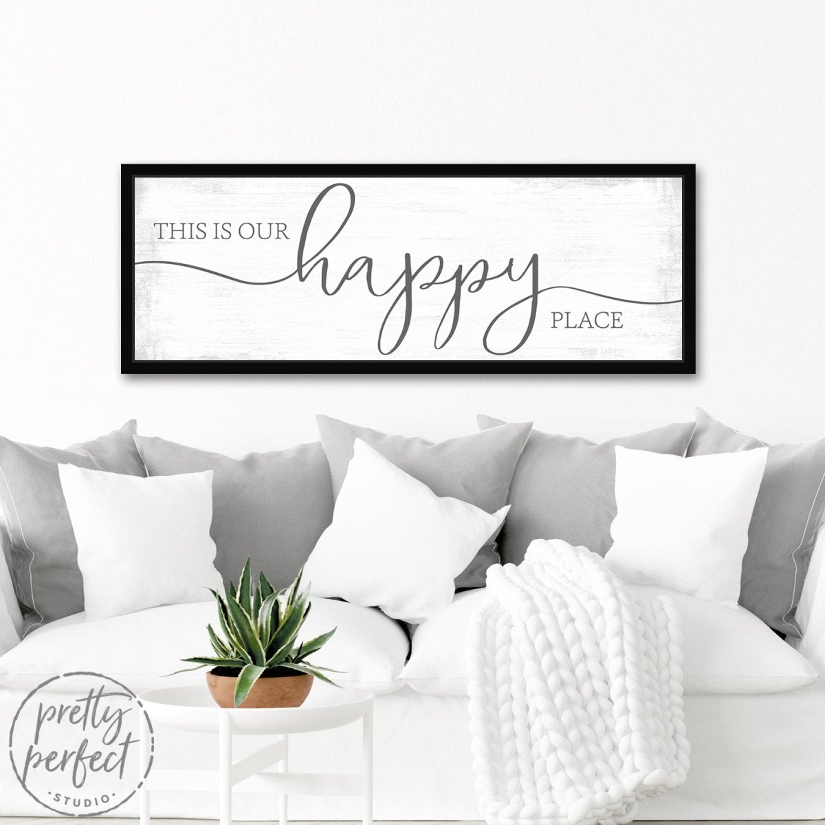 This Is Our Happy Place Sign Above Couch - Pretty Perfect Studio