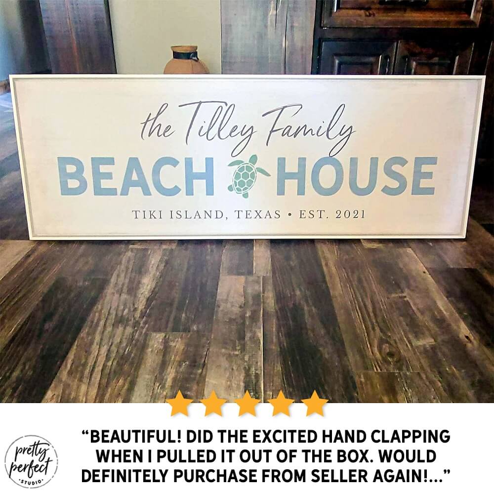 personalized beach house sign with family name, custom coastal wall art with turtle design and location, beach home decor sign for vacation house, seaside family name sign gift, customer review photo showing large beach house sign on floor