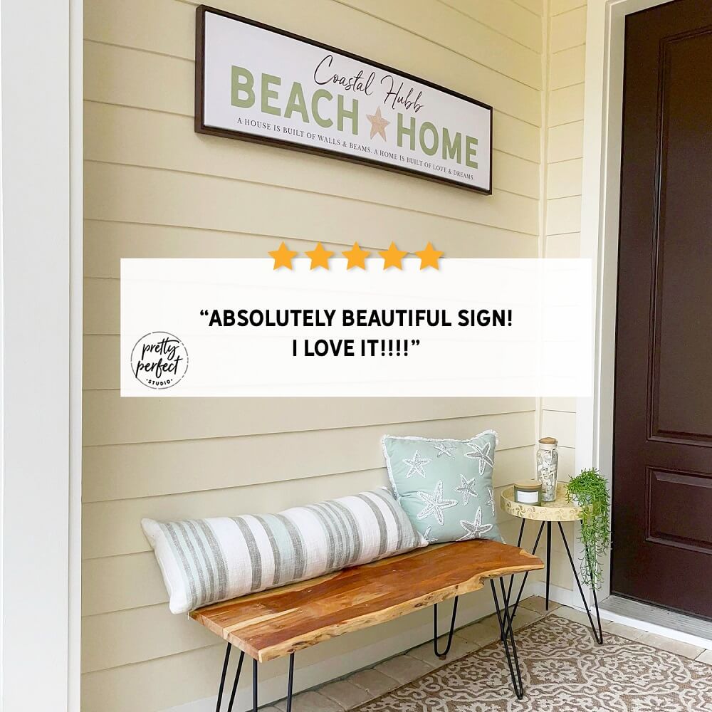 personalized beach home sign on front porch wall, custom coastal decor with text “Beach Home”, seaside entryway styling with bench and pillows, beach house welcome sign, customer review photo showing coastal porch decor and framed beach sign