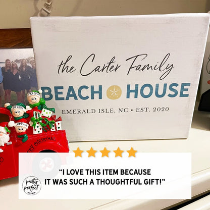 personalized beach house canvas with family name, custom coastal wall art with location, beach home decor with starfish design, seaside family sign gift, customer review photo showing beach house sign as thoughtful gift