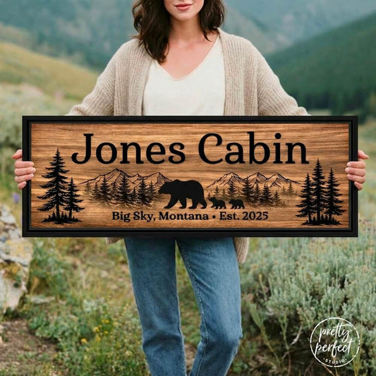 Personalized wooden cabin sign example with the name “Jones Cabin” outdoors.