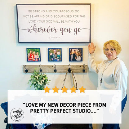 Framed Christian wall decor with “wherever you go” Bible verse styled above entryway shelf in customer home