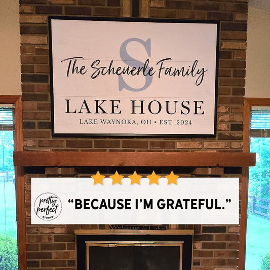 Custom lake house sign with family name in a rustic wood-style design