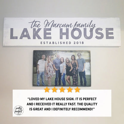 Custom lake house sign featuring family name and location in a modern farmhouse style