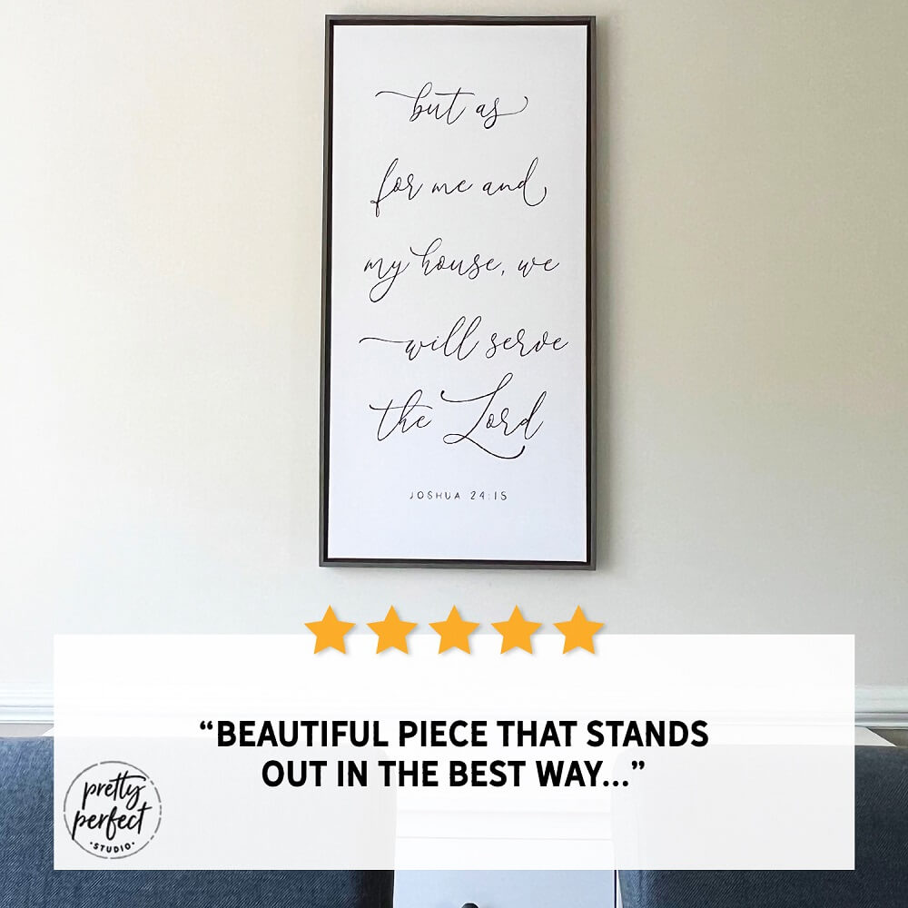 Framed motivational quote on a wall with a five-star rating and review text.