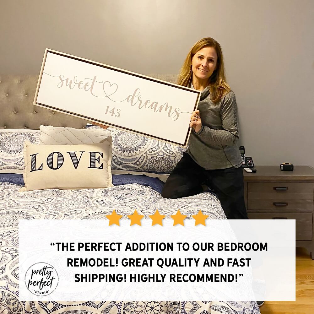 Personalized wedding gift custom home sign with a woman holding a 'sweet dreams' sign in a bedroom with five-star rating by Pretty Perfect Studio