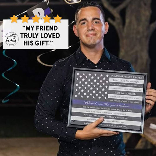 Customer holding a framed police officer's prayer as a gift with text overlay about their satisfaction.