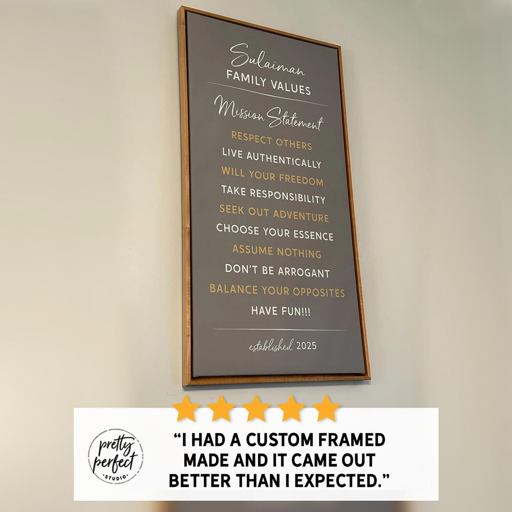 Custom framed Suliman family values wall sign featuring inspirational quotes like respect others, live authentically, and choose your essence, modern minimalist home decor