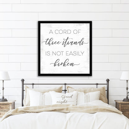 A Cord of Three Strands is Not Easily Broken Canvas Sign Above Bed - Pretty Perfect Studio