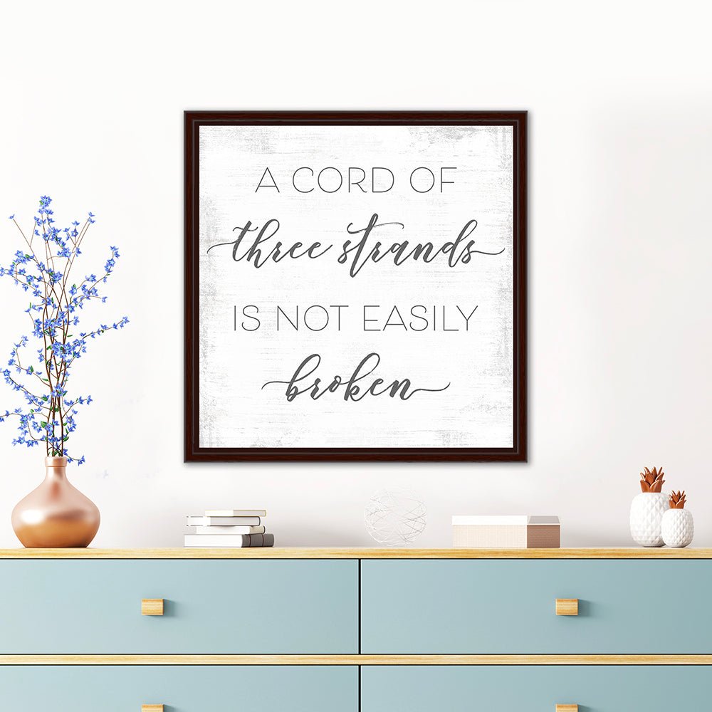 A Cord of Three Strands is Not Easily Broken Canvas Sign Above Dresser - Pretty Perfect Studio