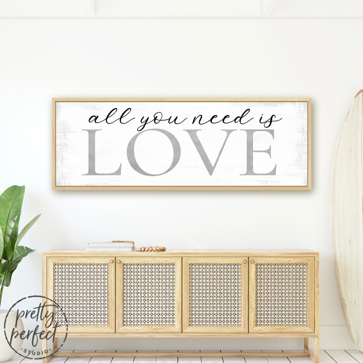 All You Need Is Love Canvas Wall Art Above Table In Living Room - Pretty Perfect Studio
