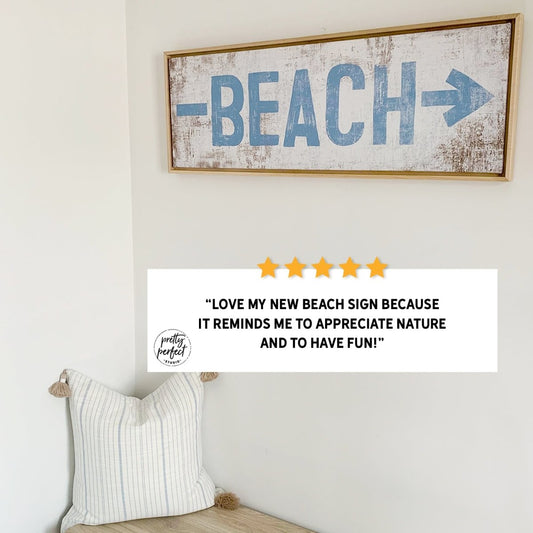 personalized beach sign displayed in coastal entryway decor setting