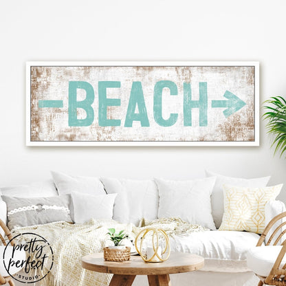 Beach Sign With Arrow Hanging on Wall Above Couch in Family Room – Pretty Perfect Studio