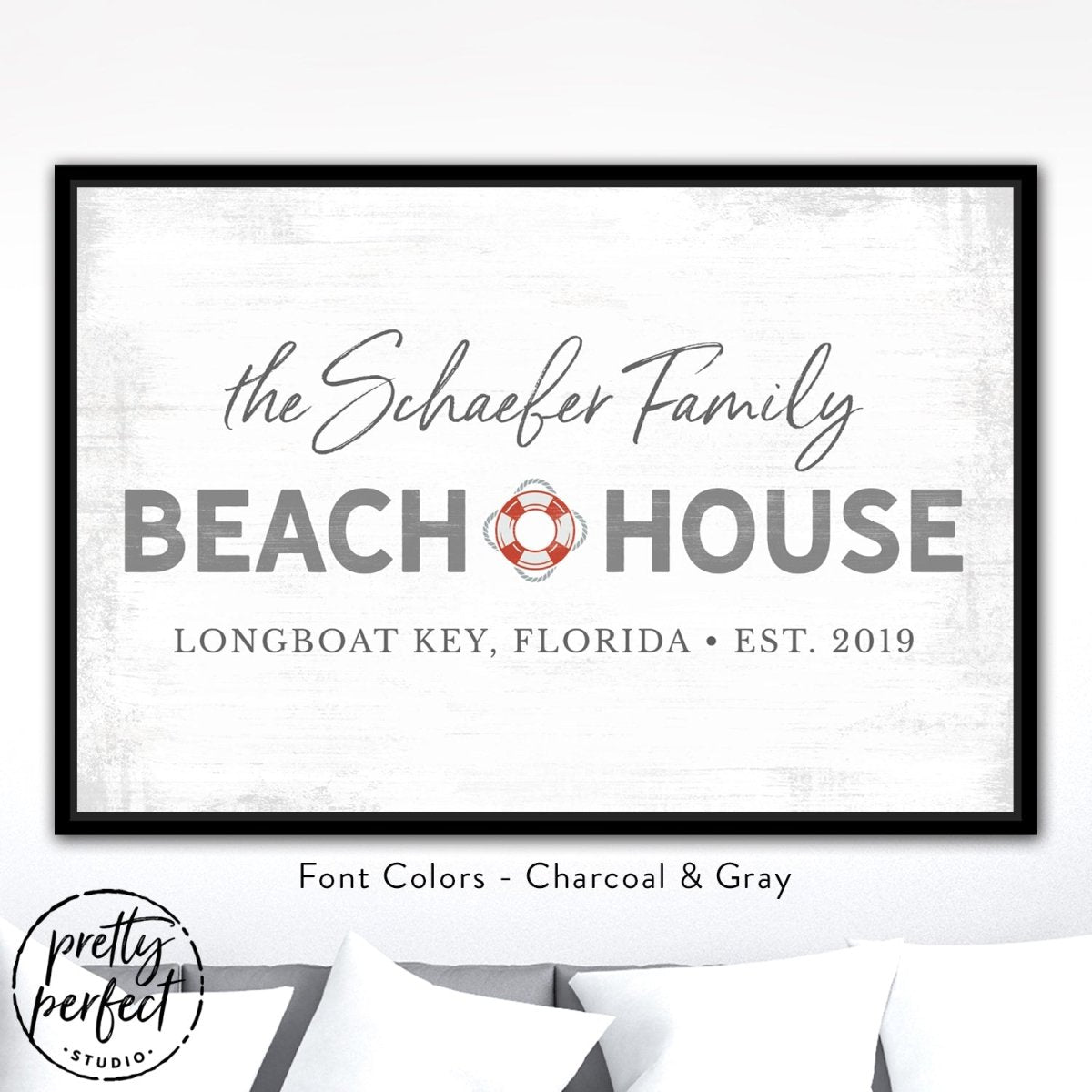 personalized beach house sign with family name, custom coastal wall decor with life preserver design, charcoal and gray beach house wall art in black frame, custom seaside family name sign with location and date