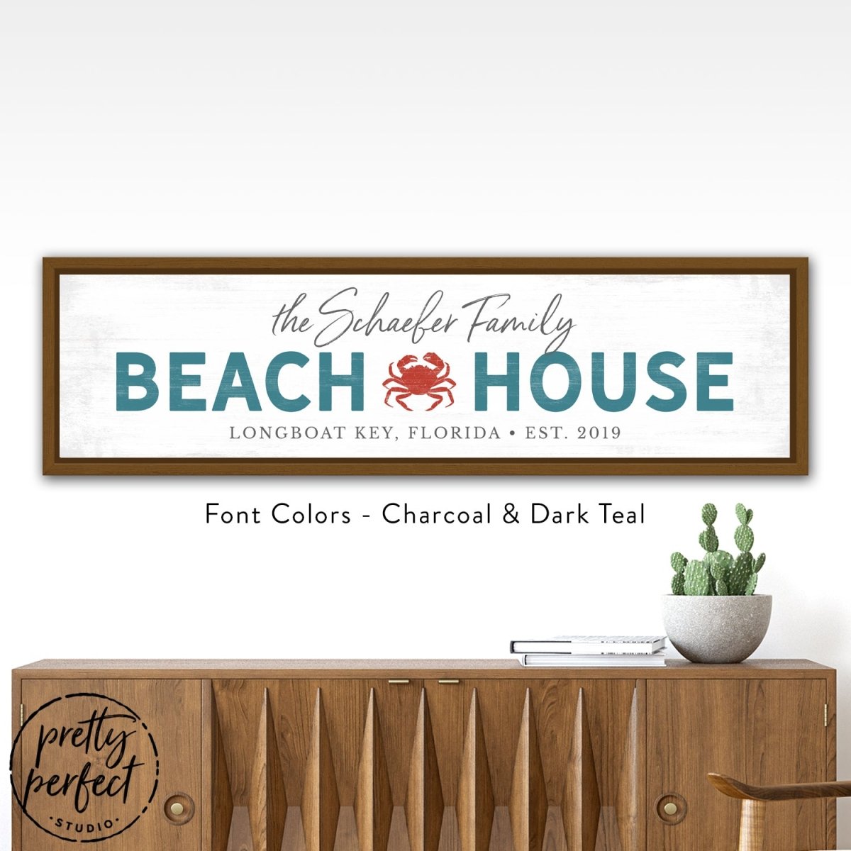 personalized beach house sign with family name, custom coastal wall decor with crab design, teal and charcoal beach house wall art in wood frame, custom seaside family name sign for entryway decor