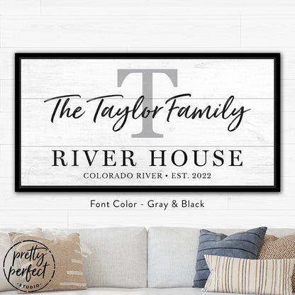 Custom river house family sign styled in bright home interior
