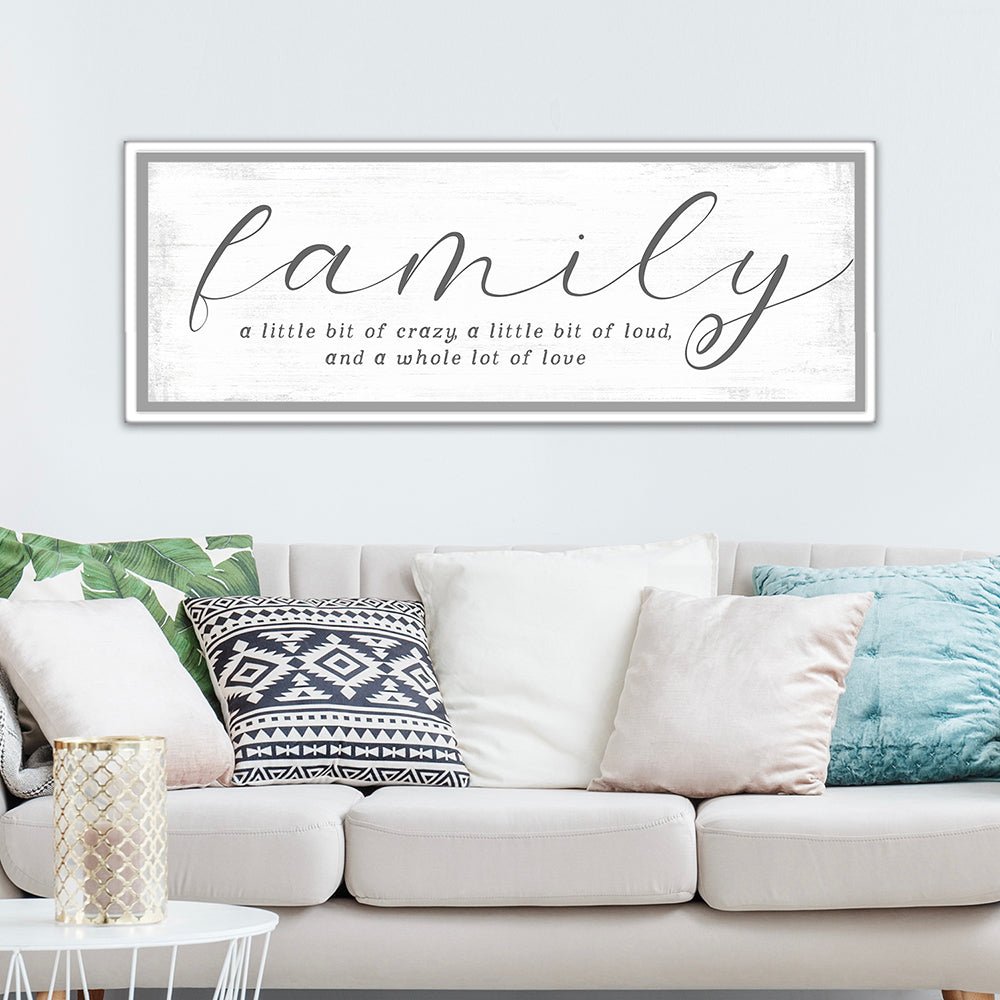 Family A Little Bit Of Crazy Sign Above Couch - Pretty Perfect Studio