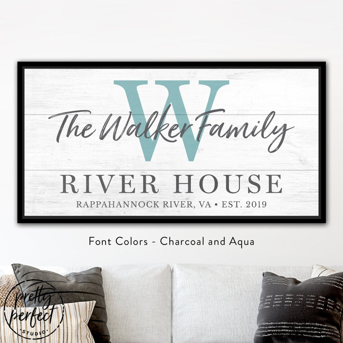 Personalized river house wall art displayed above sofa in cozy farmhouse living room