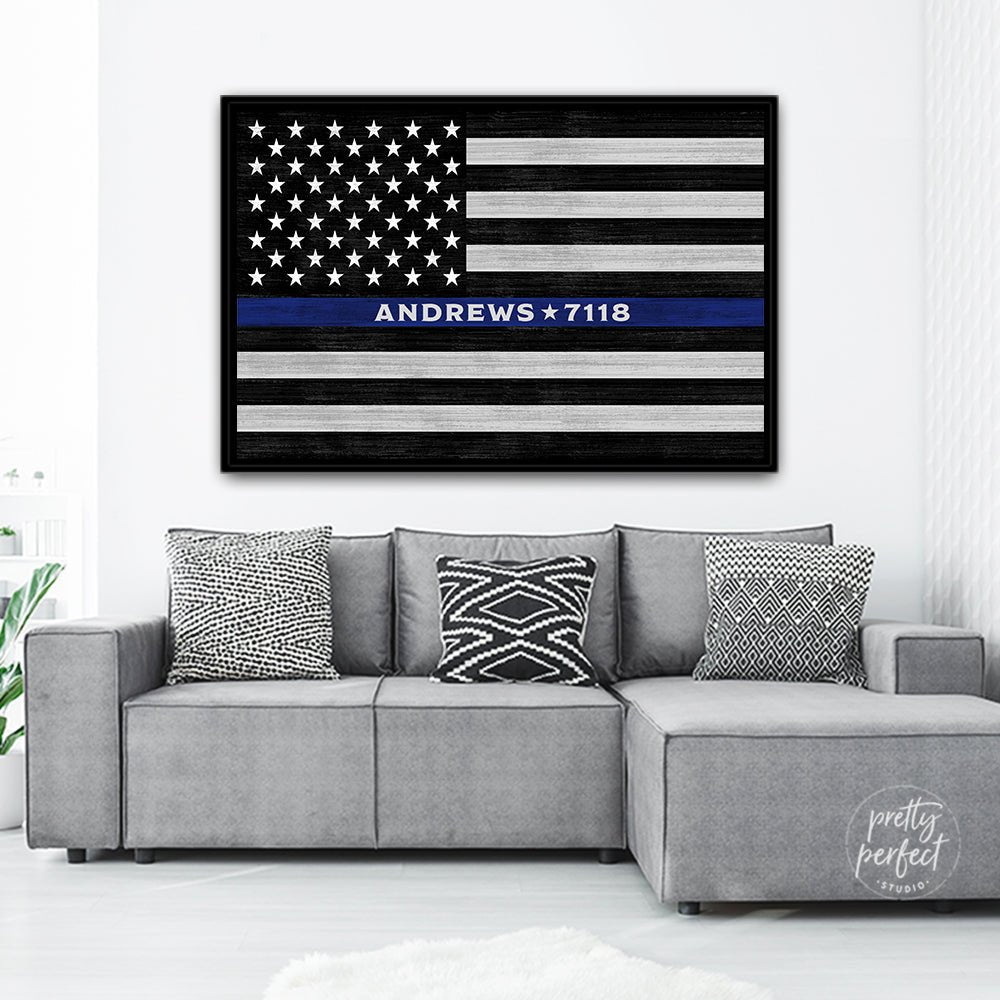 Flag Sign Personalized With Police Officer Name Above Couch in Living Room - Pretty Perfect Studio