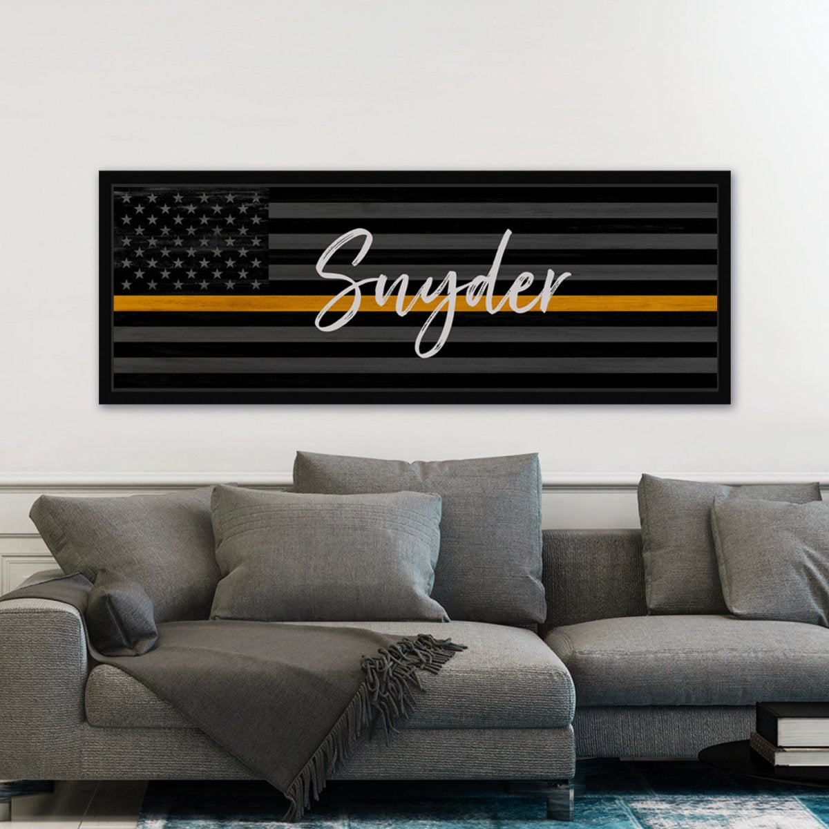 Flag Sign With Thin Gold Line For 911 Dispatchers & Tow Truck Drivers Above Couch - Pretty Perfect Studio