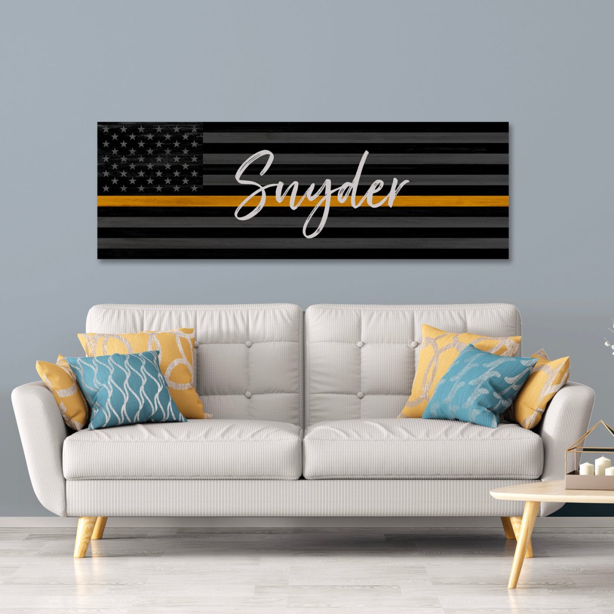 Flag Sign With Thin Gold Line For 911 Dispatchers & Tow Truck Drivers Above Couch - Pretty Perfect Studio