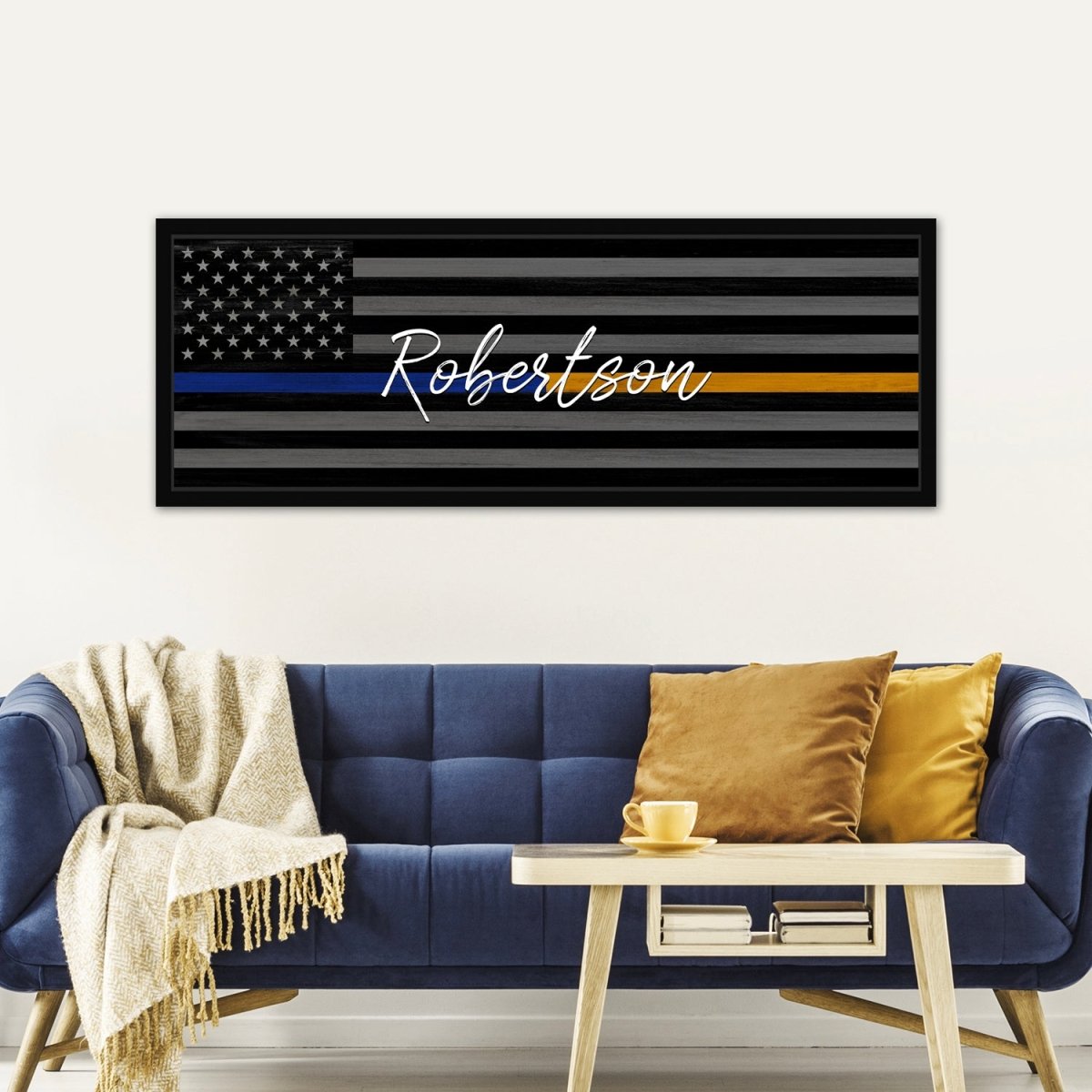 Gold Line Flag Sign For 911 Dispatchers & Tow Truck Drivers Above The Couch - Pretty Perfect Studio