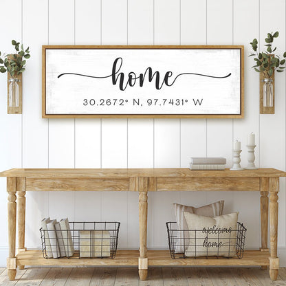 personalized home coordinates sign with wooden frame on shiplap wall above rustic console table with farmhouse decor