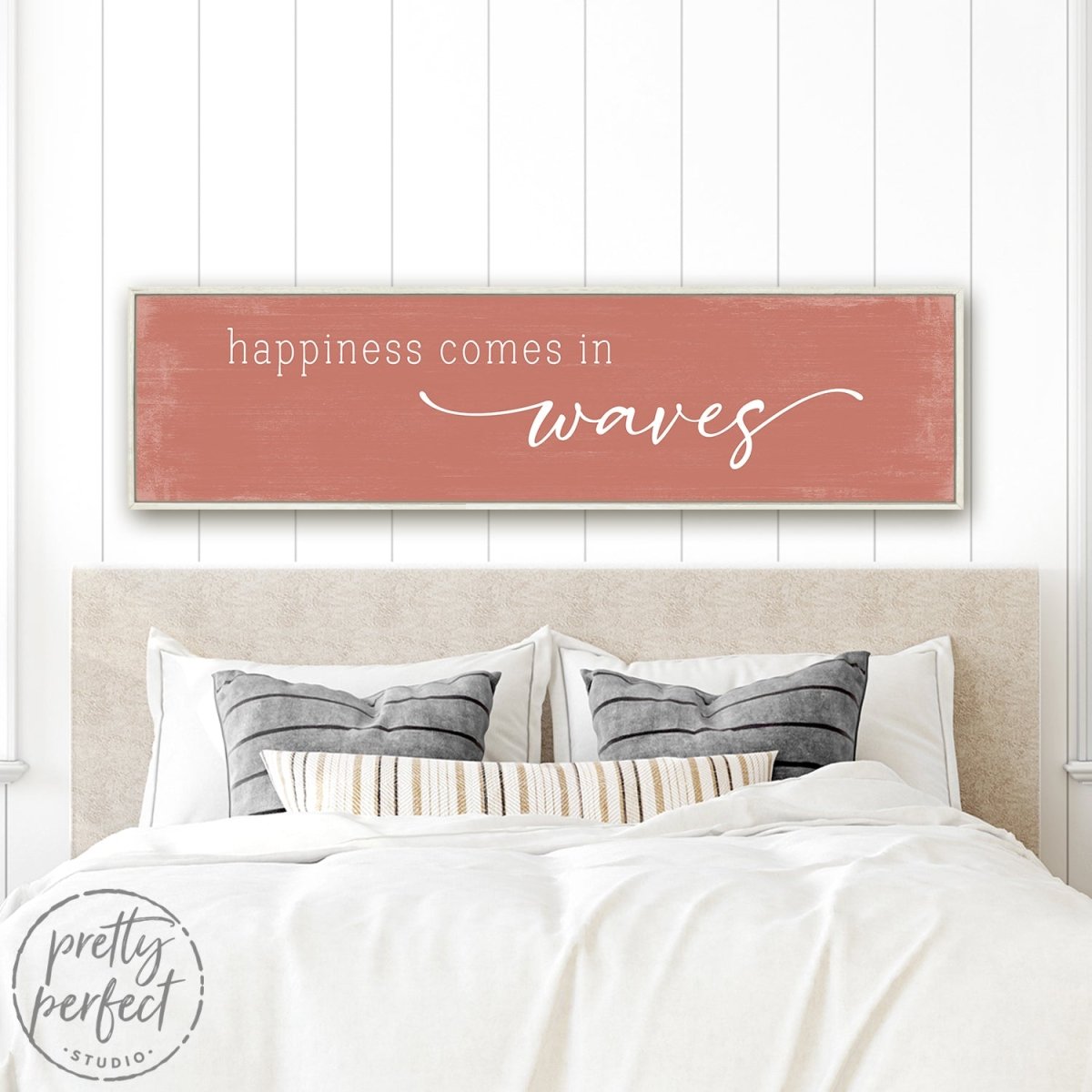 Happiness Comes in Waves Sign Hanging on Wall Above Bed - Pretty Perfect Studio