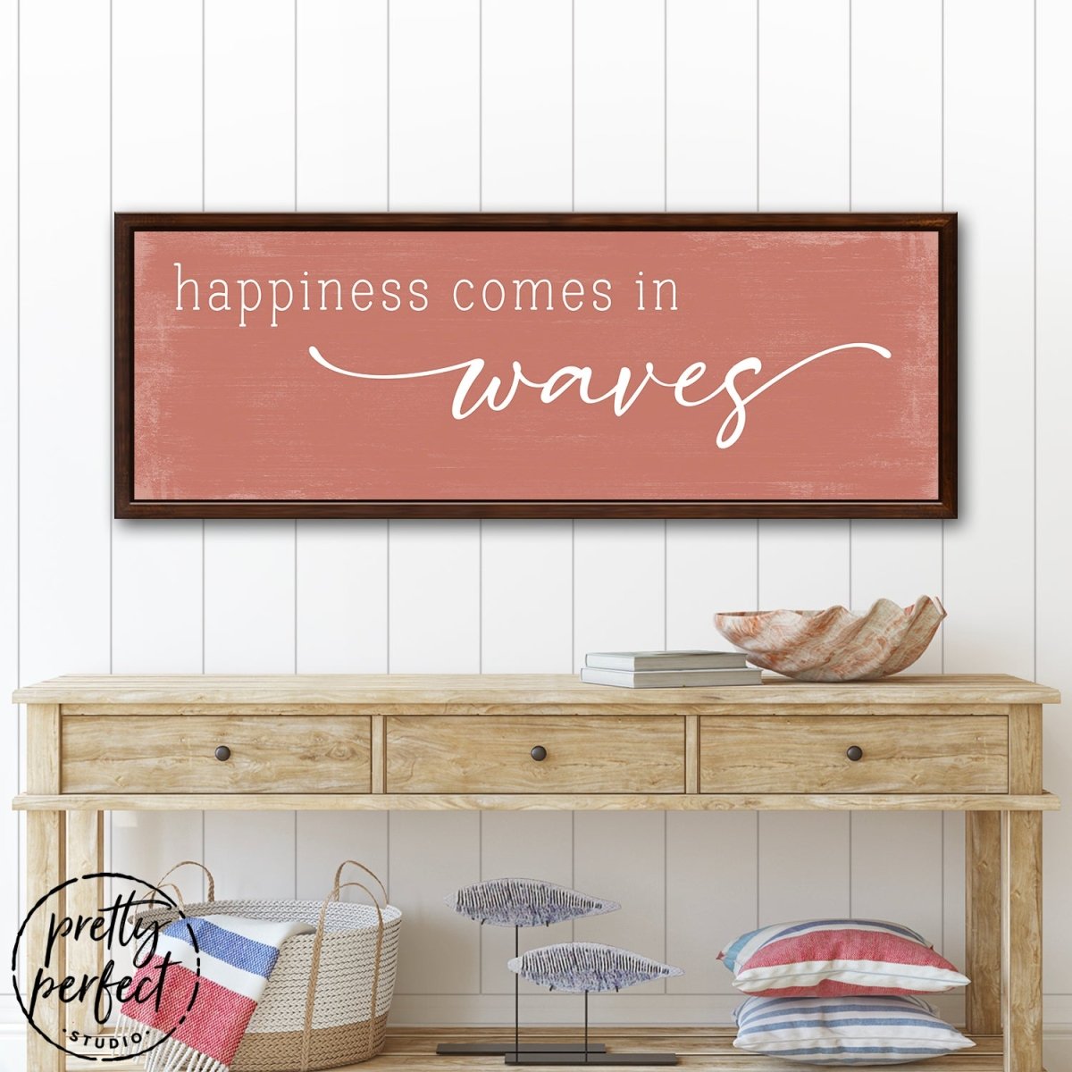 Happiness Comes in Waves Sign Hanging on Wall Above Entryway Table - Pretty Perfect Studio