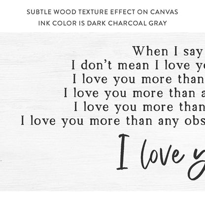 When I Say I Love You More Sign With A Subtle Wood Texture Effect On Canvas - Pretty Perfect Studio