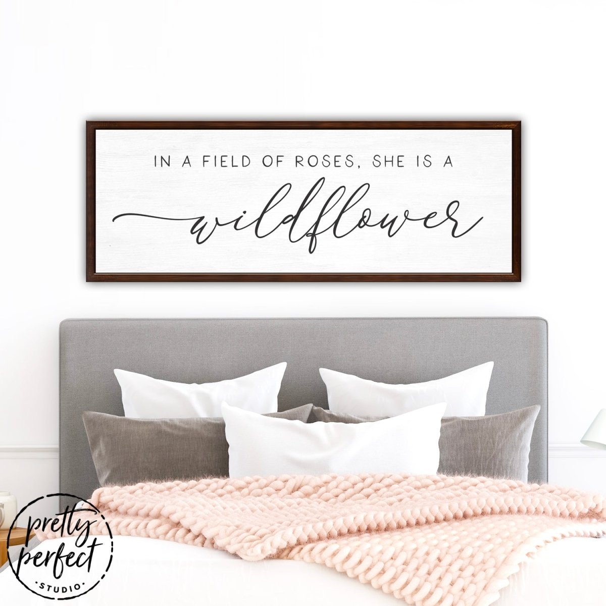 In A Field Of Roses She Is a Wildflower Sign Hanging Above Bed - Pretty Perfect Studio