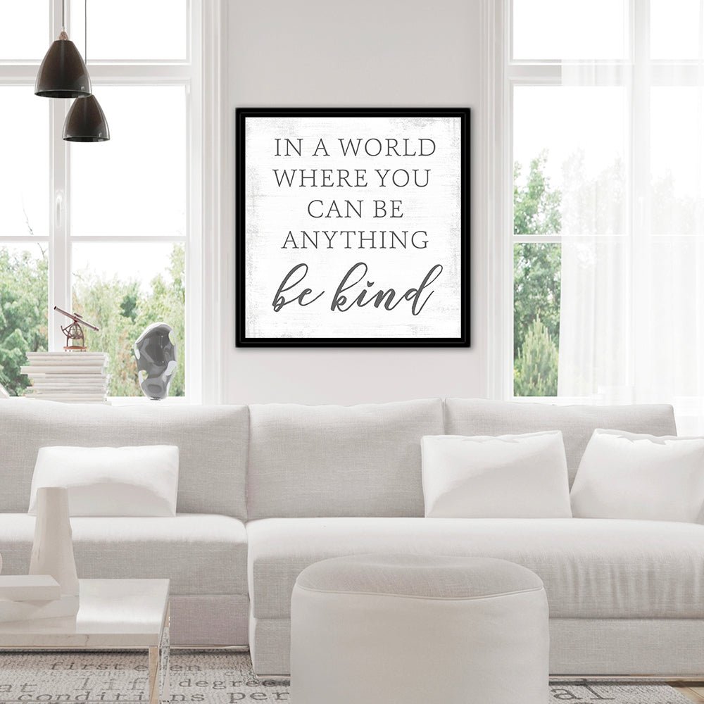 In a World Where You Can Be Anything Be Kind Sign Above Couch - Pretty Perfect Studio